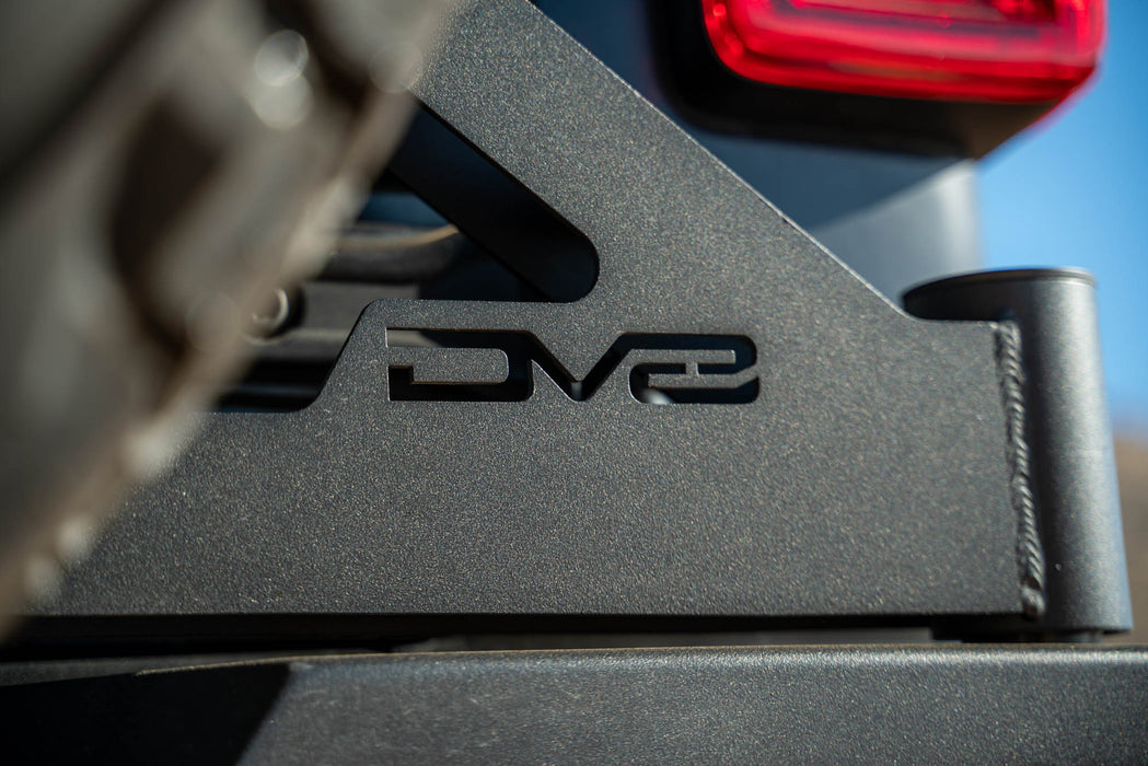 DV8 logo cutout on the MTO Series Bumper Spare Tire Swing Gate for the 2018-2023 Jeep Wrangler JL