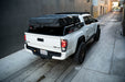 Universal MTO Series Mid-Size Truck Bed Rack and low profile of the roof top tent
