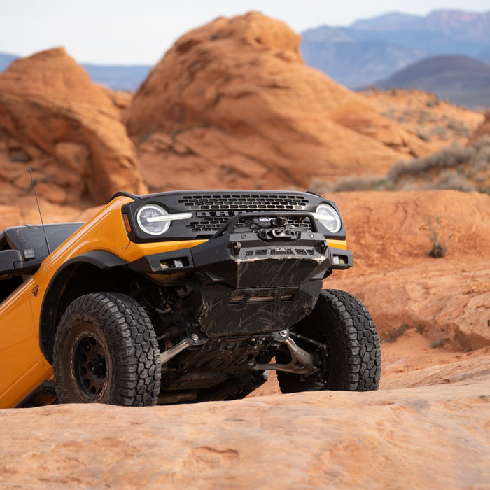 A Bronco outfitted with DV8 traversing off-road.