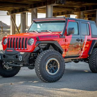 Red suped up Jeep