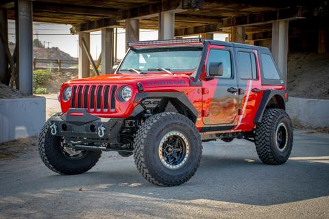 Red suped up Jeep