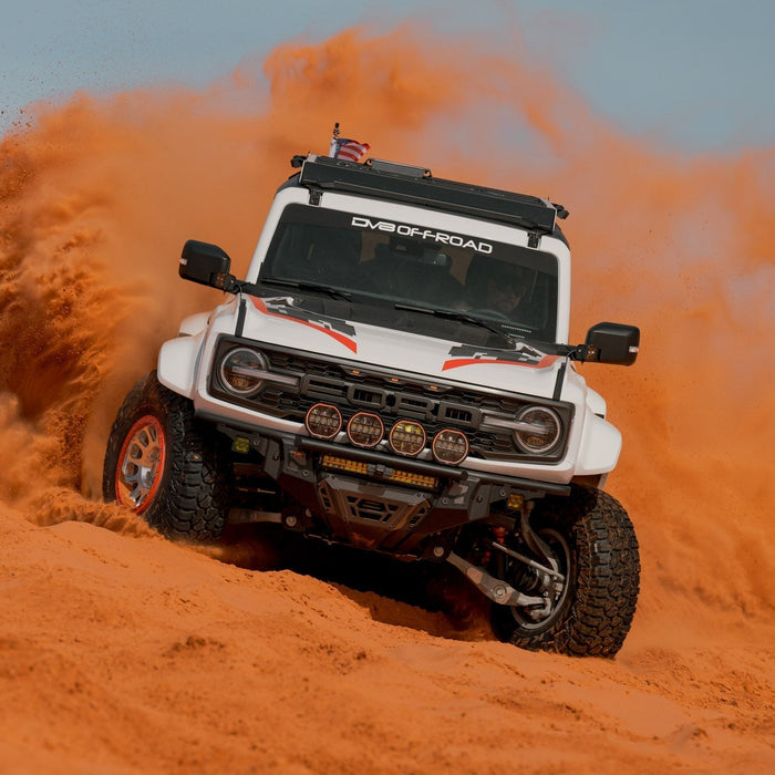 A Bronco Raptor drifting off-road.
