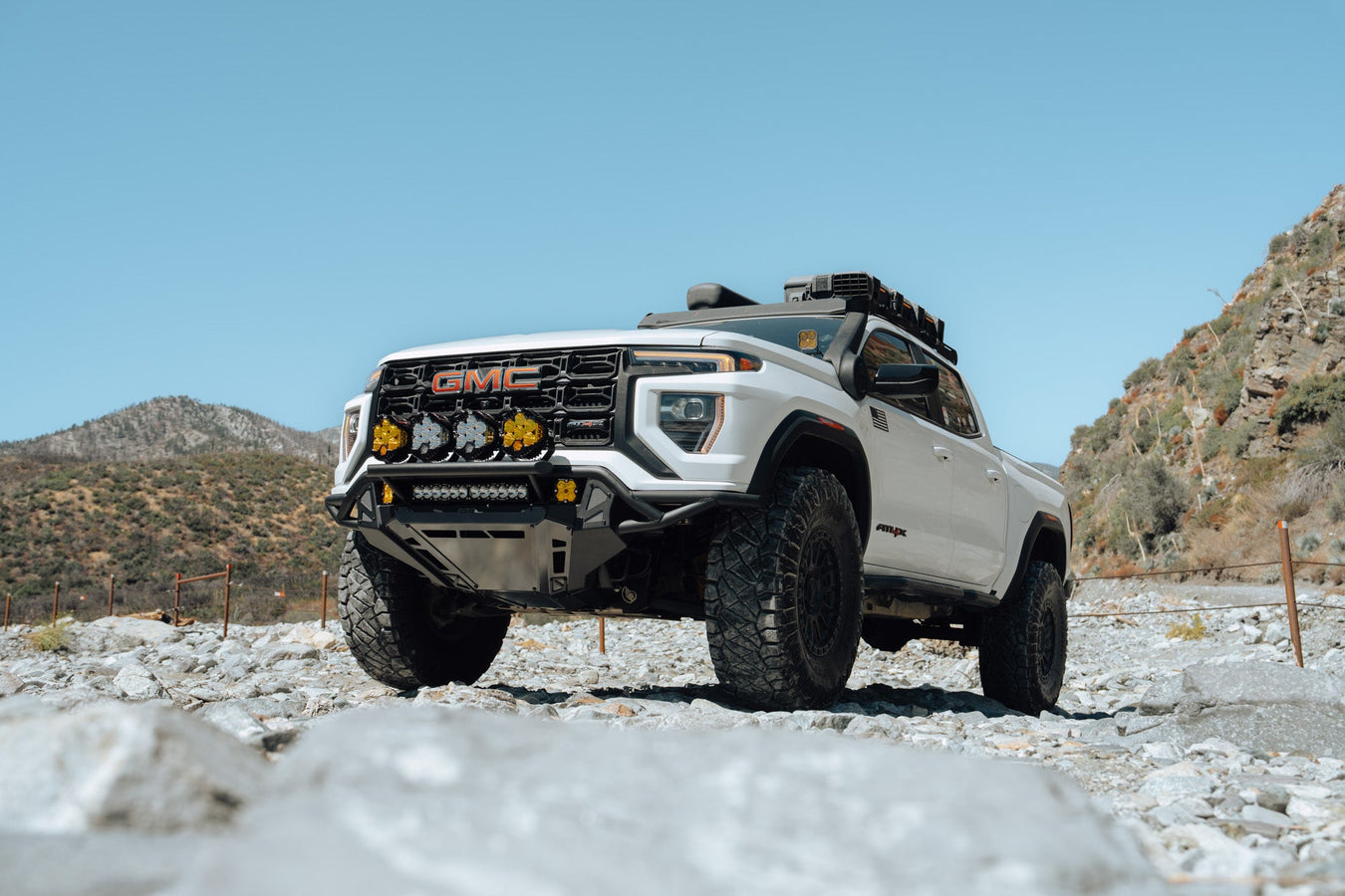 Low angle view showing maximum clearance with DV8 GMC Canyon Tube Front Bumper installed