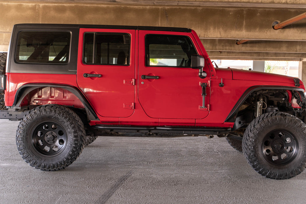 Side profile with OE Plus Side Steps for the 2007-2018 4-Door Jeep Wrangler JK installed