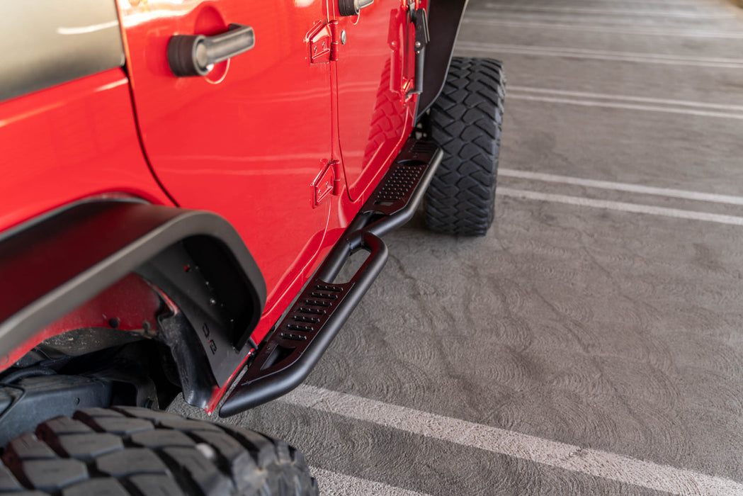 Full-length anti-slip perforations on the OE Plus Side Steps for the 2007-2018 4-Door Jeep Wrangler JK