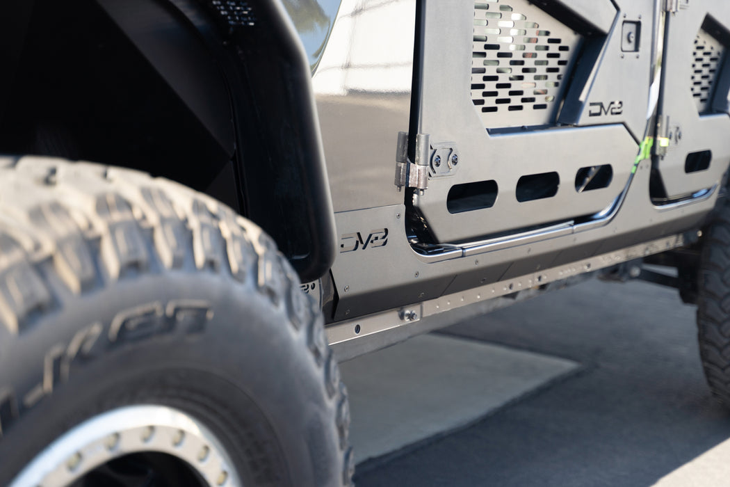 2018-2023 Jeep Wrangler JL 4-Door Rock Skins installed with DV8 Logo visible