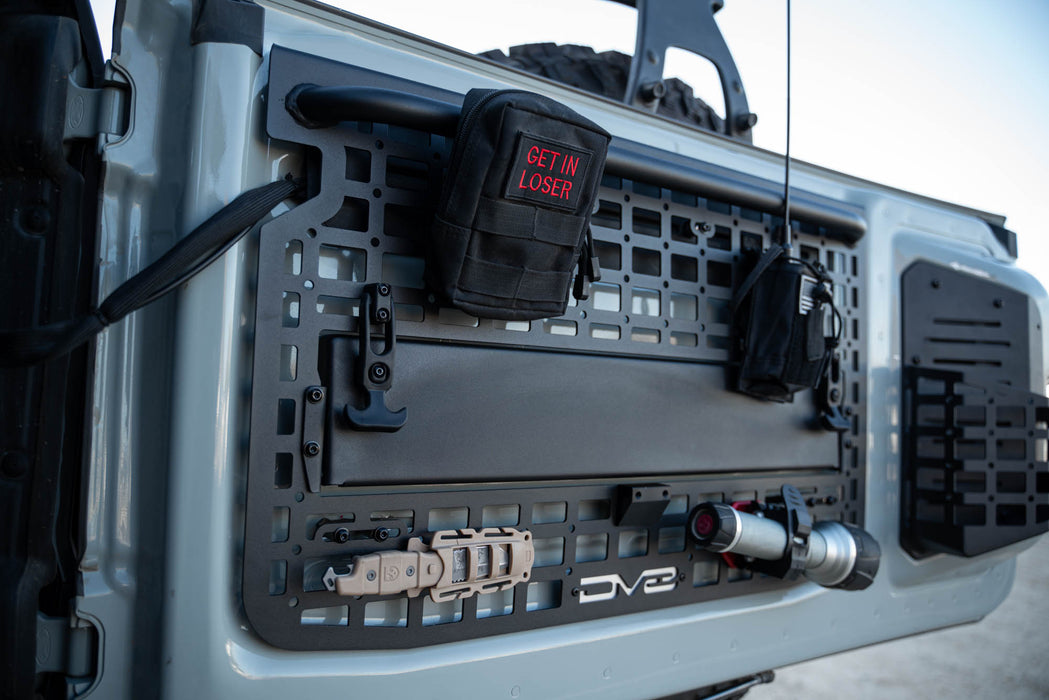 Gear mounted to Tailgate Molle Panel for the 2021-2023 Ford Bronco