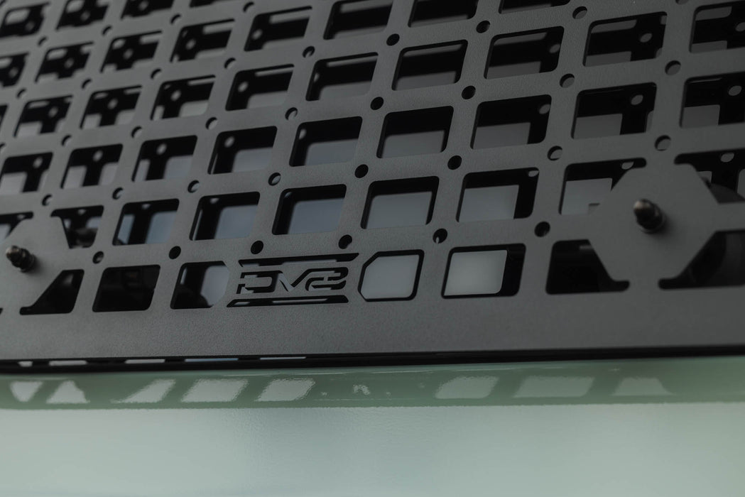 Close up view of small DV8 logo on 2025-2026 4Runner Exterior Window Molles for DV8 Roof Rack installed