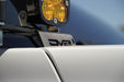Close-up of 4th Gen Toyota Tacoma Ditch Light Brackets on a blurred background