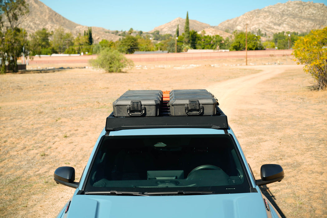 Spec Series Roof Rack for 6th Gen Toyota 4Runner with roof storage boxes in a desert landscape