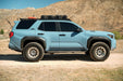 Blue 4Runner with off-road tires and 6th Gen Spec Series Roof Rack in a desert landscape
