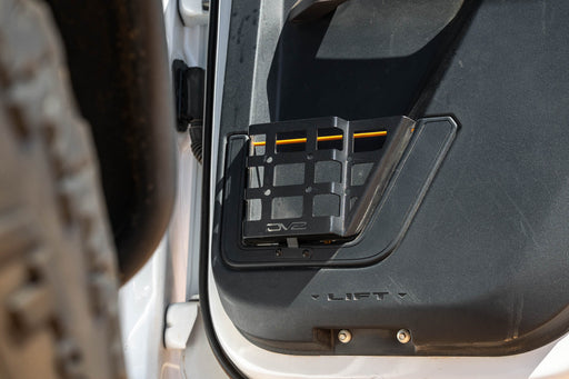 Bronco rear door molle pocket, installed with warm sun shining on it.