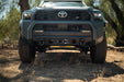 Front view of a 6th Gen Toyota 4Runner Centric Winch Front Bumper in a natural setting