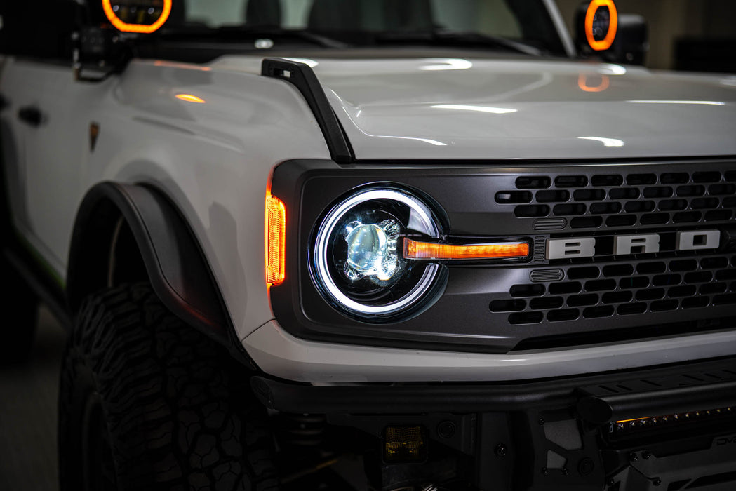 Interior shot with the Ford Bronco Black Headlights projector beams turned on.