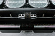 Low-angle view looking up at installed Ford Bronco & Bronco Raptor Tube Front Bumper Camera Relocation Bracket 