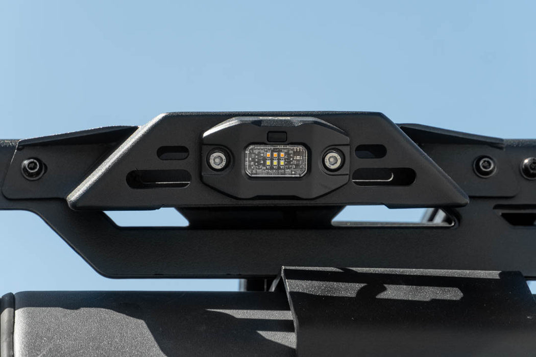 Elite White/Amber Push Button Dome Light mounted to roof rack for exterior lighting