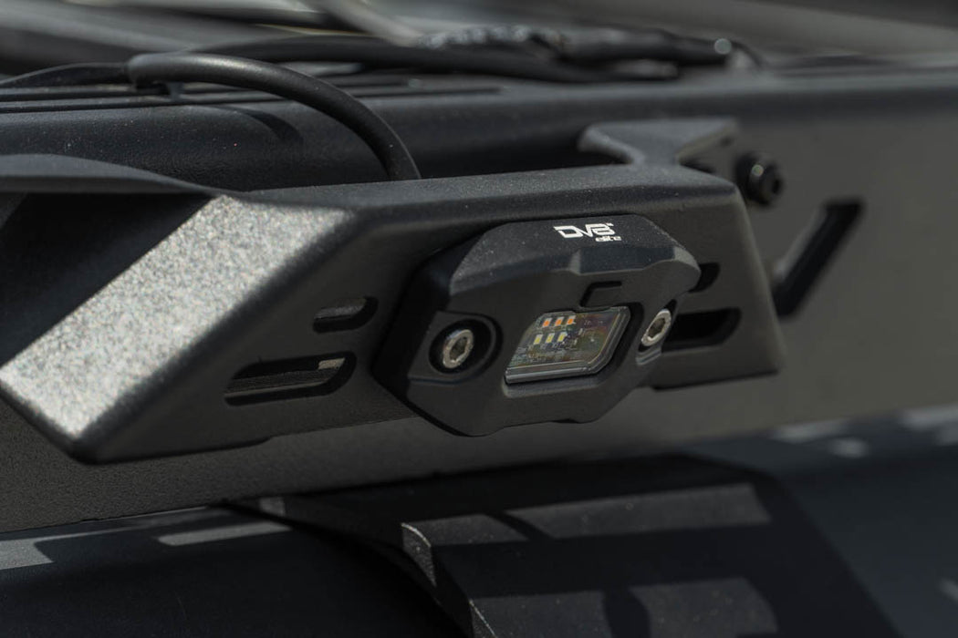 Angled view of Elite White/Amber Push Button Dome Light used as exterior light attached to roof rack