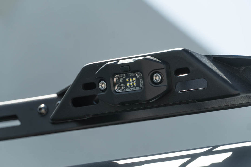 Elite White Push Button Dome Light mounted to Roof Rack for exterior side lighting