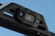 Elite White Push Button Dome Light mounted to roof rack side rail