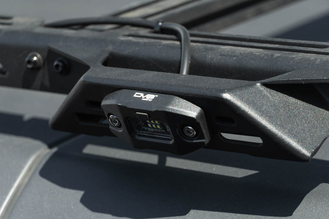 View of DV8 Elite White Push Button Dome Light installed on roof rack for exterior lighting