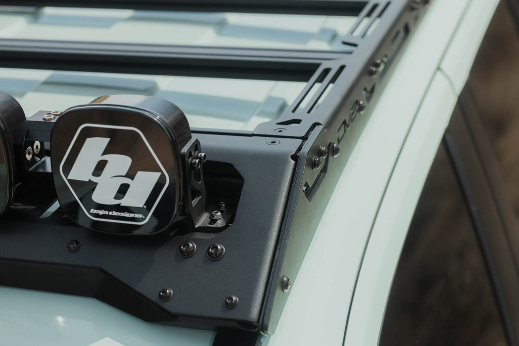 Baja Designs Linkable Lightbar Mount for DV8 Roof Rack Light Option installed on vehicle roof rack with Baja Designs off road lights
