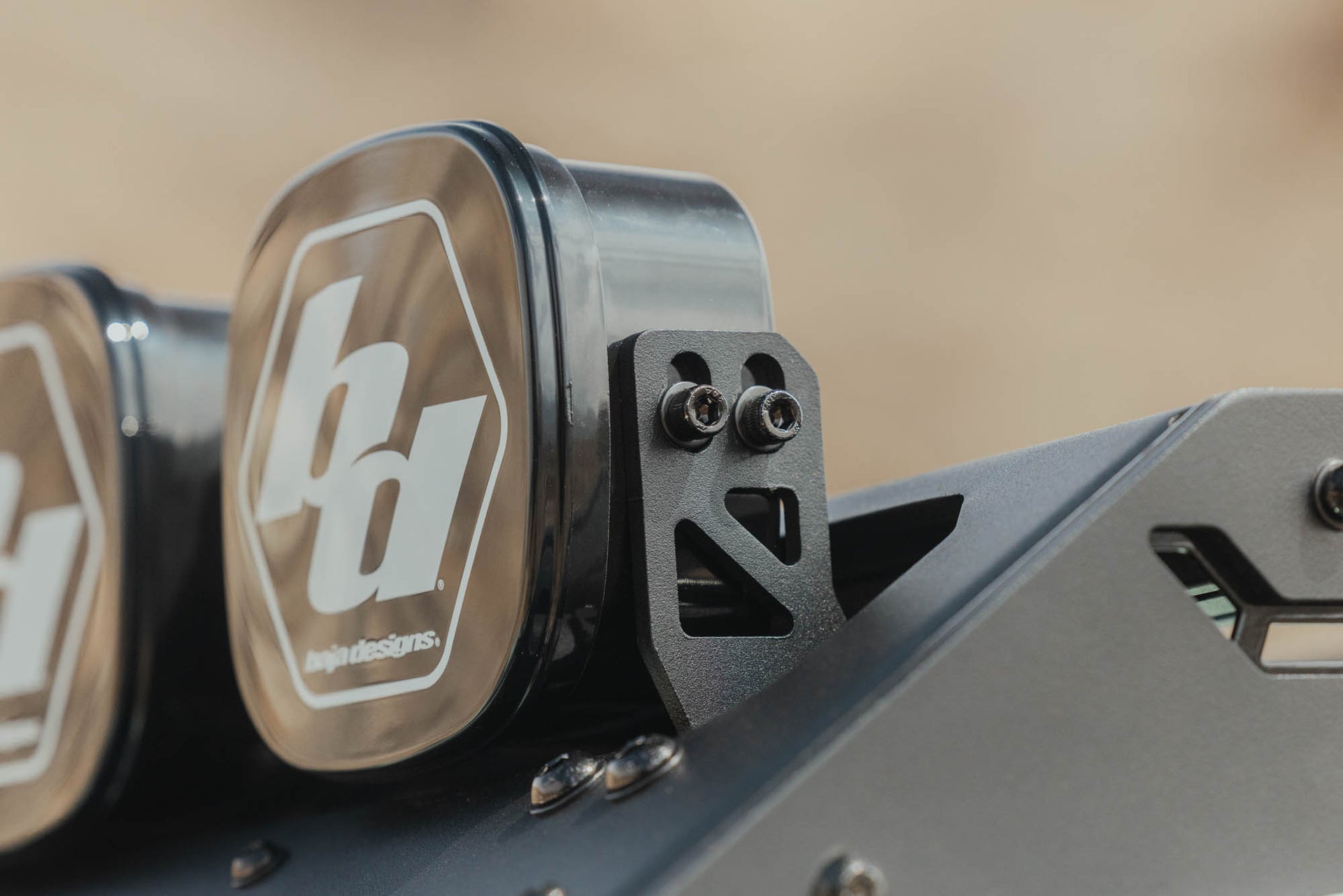 Close up view of installed Baja Designs Linkable Lightbar using Mount for DV8 Roof Rack Light Option