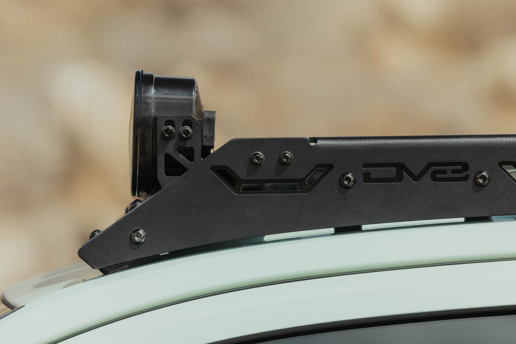 Side view of Baja Designs Linkable Lightbar Mount for DV8 Roof Rack Light Option installed with DV8 Toyota 4runner roof rack