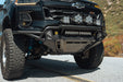 Passenger angled view of 2023+ Chevy Colorado Tube Front Bumper installed with integrated skid plate and push bar 