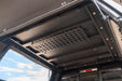Universal Molle Panel mounted to the interior of a truck rack.