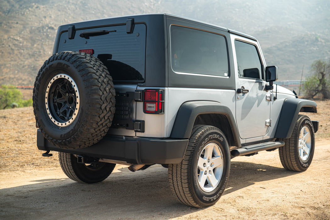 Jeep Wrangler JK Tailgate Reinforcement Molle Panel installed with full-size spare