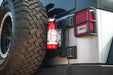 Red fire extinguisher attached to Jeep Wrangler JK Tailgate Reinforcement Molle Panel