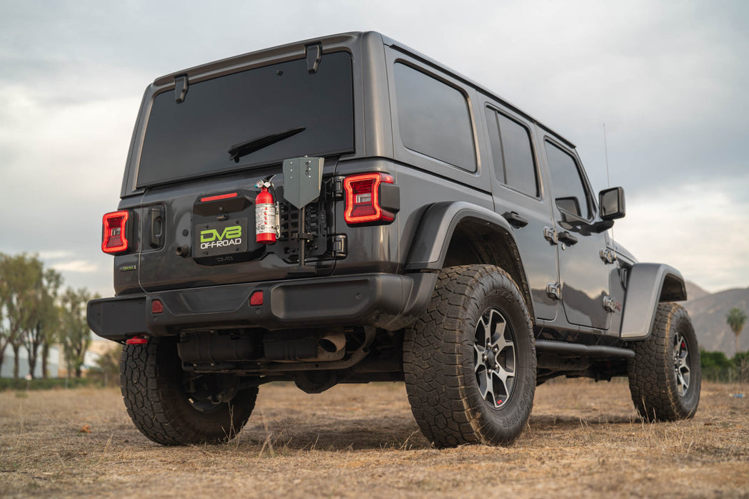 Jeep Wrangler JL Tailgate Reinforcement Molle Panel Installed with fire extinguisher and shovel.
