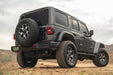 Gray Jeep Wrangler with Jeep Wrangler JL Tailgate Reinforcement Molle Panel Installed in a desert landscape