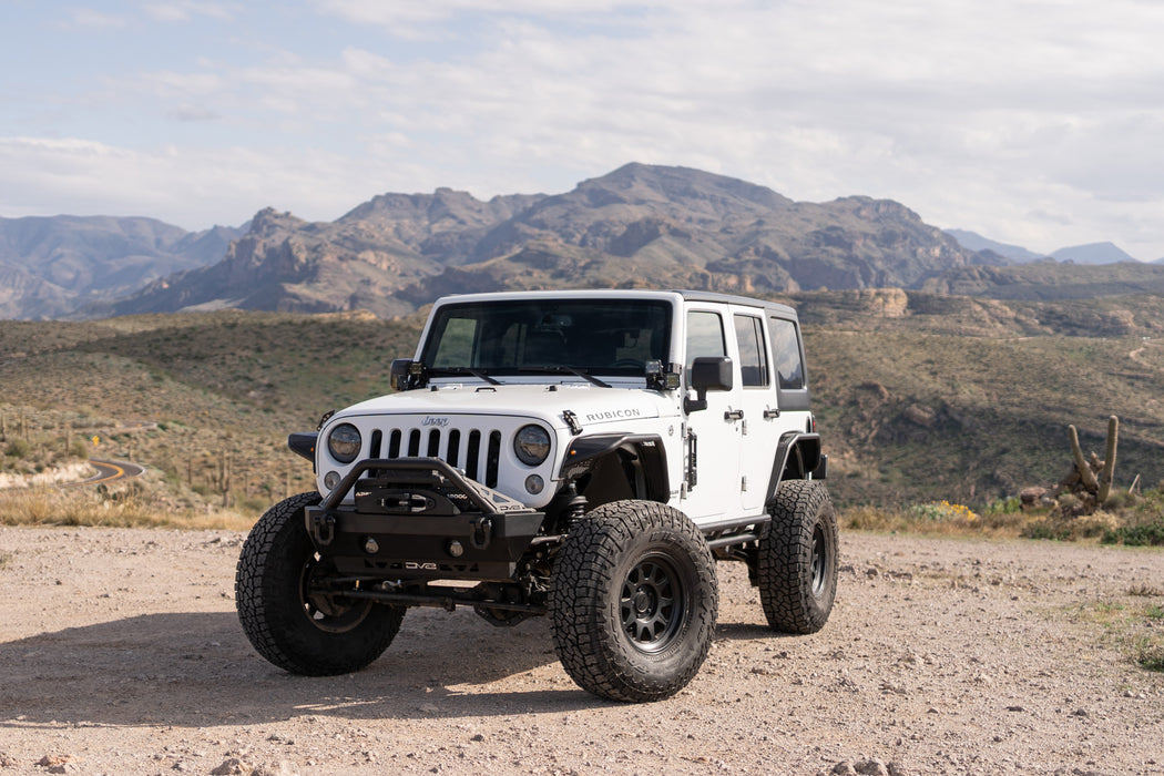 2007-2018 Jeep Wrangler JK Dual Pod Light Mounts installed on rig driving in the mountains