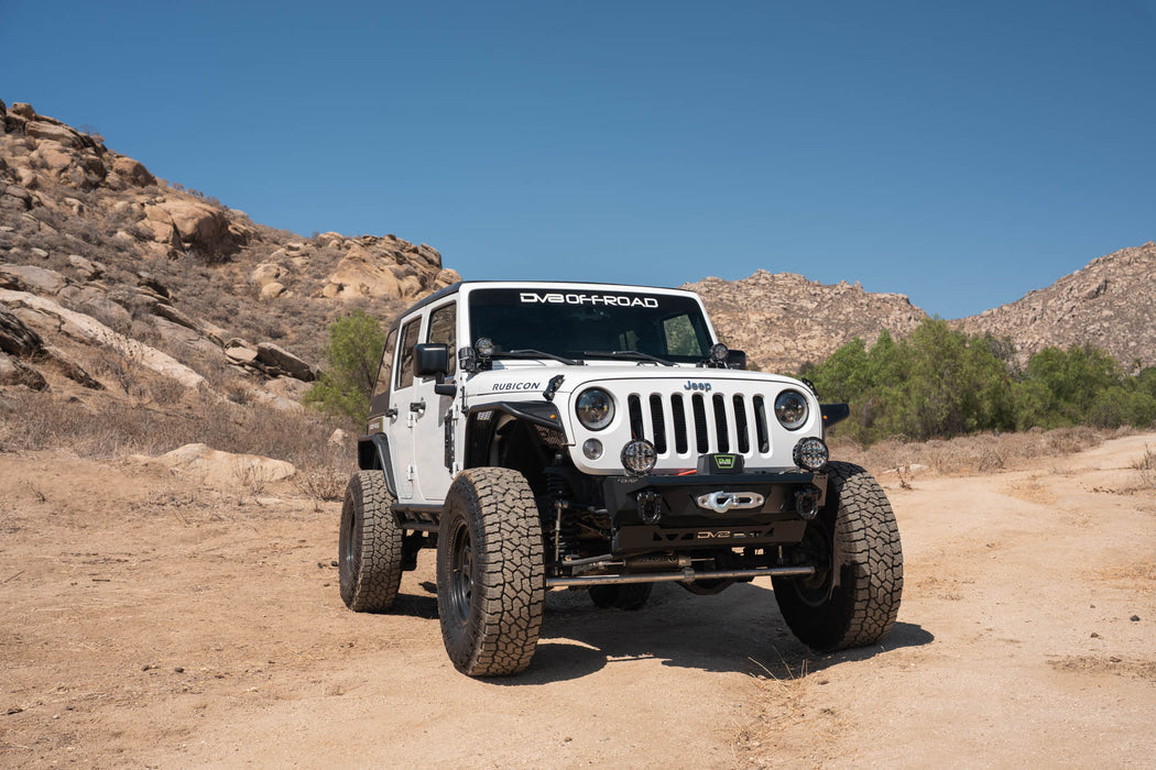 DV8 Jeep Wrangler JK parked in the desert mountains with 2007-2018 Jeep Wrangler JK Dual Pod Light Mounts installed