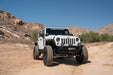 DV8 Jeep Wrangler JK parked in the desert mountains with 2007-2018 Jeep Wrangler JK Dual Pod Light Mounts installed