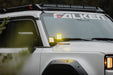 2024+ Toyota Land Cruiser Ditch Light Brackets installed with DV8 Elite Series Amber Lights turned on