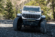 Jeep with DV8 Spec Series bumper and the Universal Spec Series Bull Bar installed with light bar