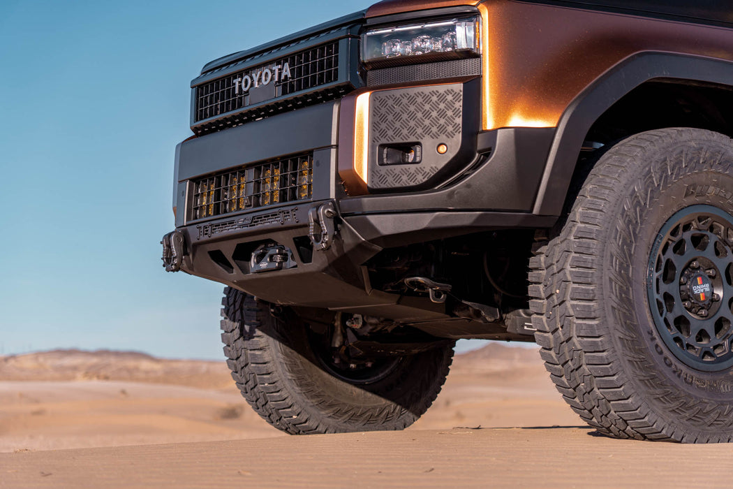 Close-up of 250 Series Land Cruiser with Spec Series Front Bumper in a desert setting