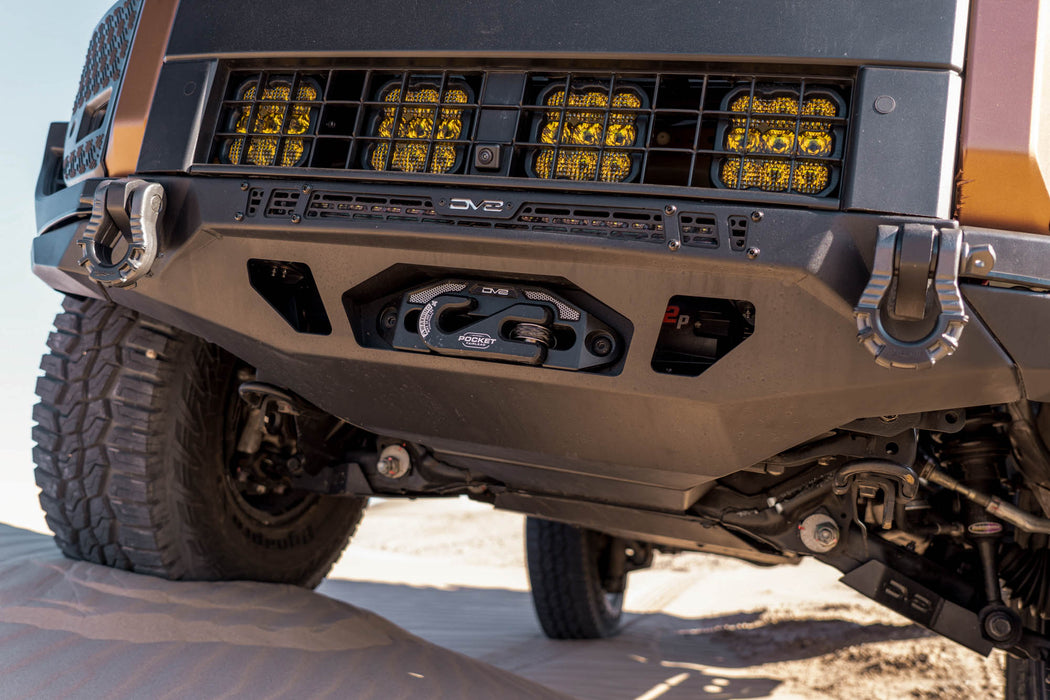 Close-up of 250 Series Land Cruiser with Spec Series Front Bumper with LED lights on a clear day.