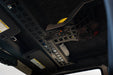 Overhead Molle Storage Panel for 2007-2018 Jeep Wrangler JK with CB radio and knife holder installed, and items stored above the panel