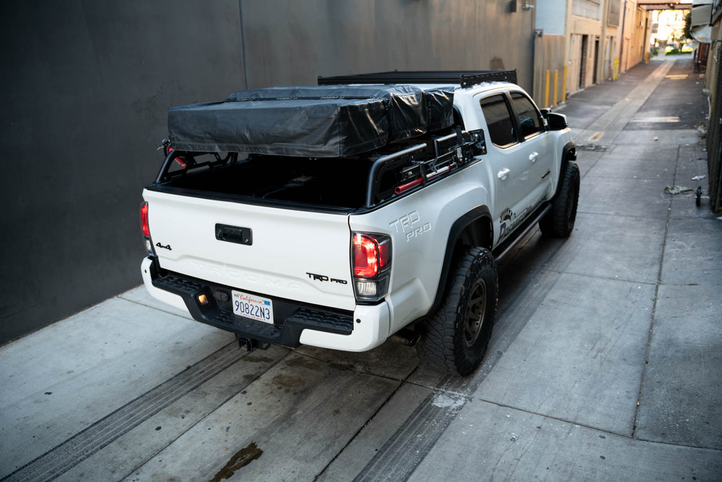 Universal MTO Series Mid-Size Truck Bed Rack and low profile of the roof top tent
