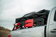 Shovel and fire extinguisher on the Universal MTO Series Mid-Size Truck Bed Rack