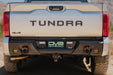 Closer rear view of DV8 Tundra TRD 4x4 with 2022+ Toyota Tundra Spec Series Rear Bumper installed 