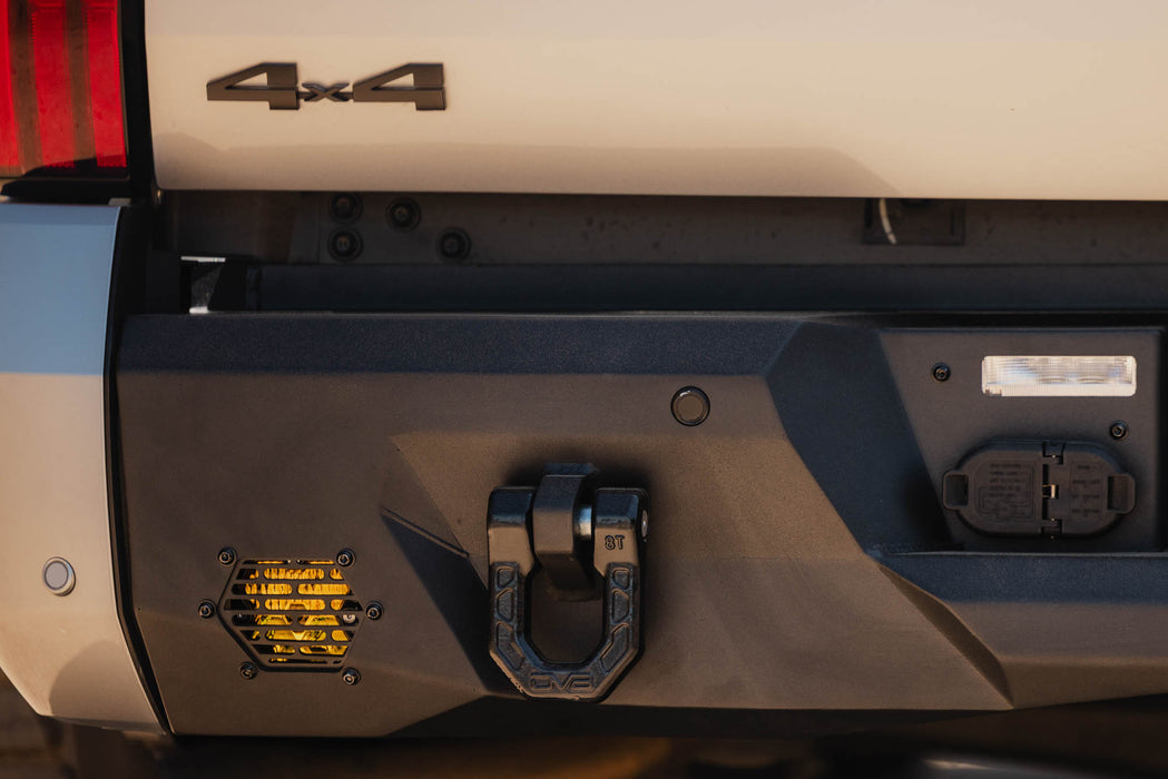 Detail view of 2022+ Toyota Tundra Spec Series Rear Bumper installed with 3" lights from baja designs and DV8 D-ring shackles installed