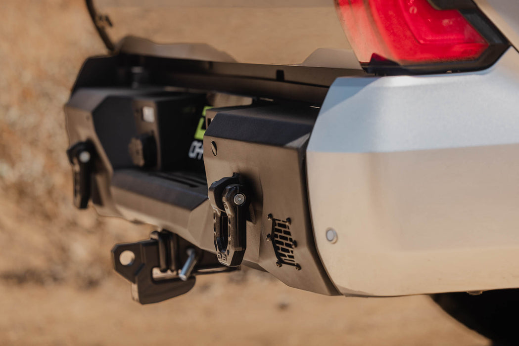 Angled view showing precision fitment and protected lighting provisions of installed 2022+ Toyota Tundra Spec Series Rear Bumper