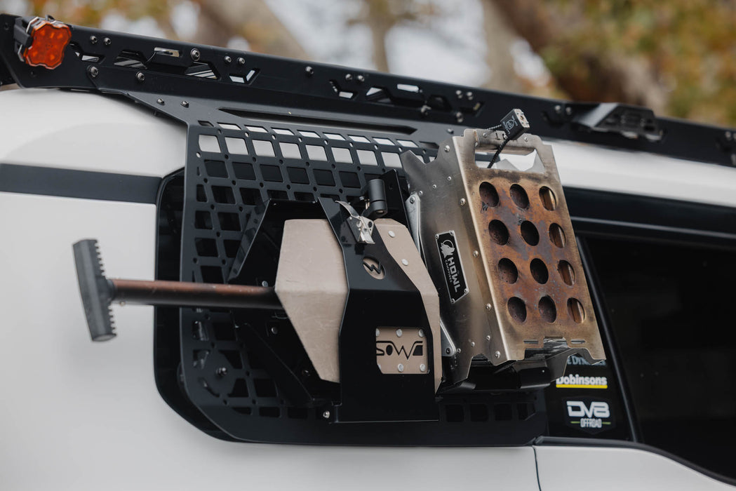 Howl firepit and folding shovel attached to isntalled 2024+ Toyota Land Cruiser & Lexus GX 550 Exterior Window Molle Panels 