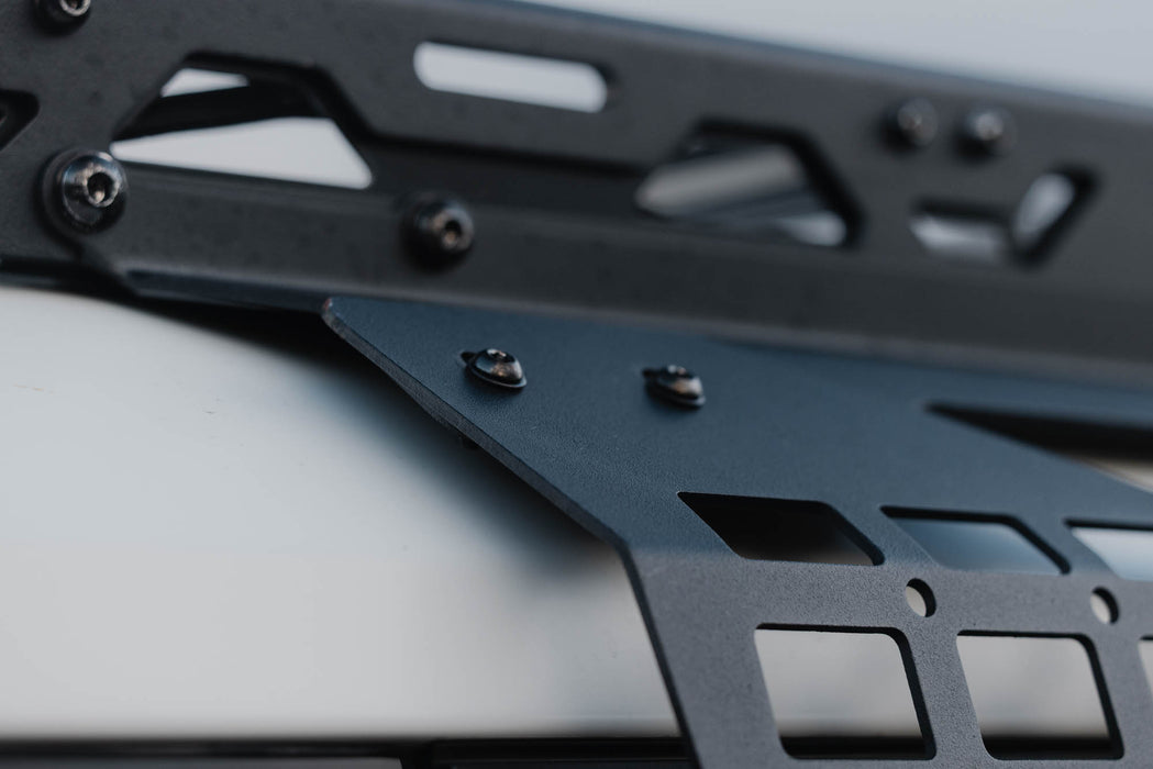 Detail view of mounting connection of the 2024+ Toyota Land Cruiser & Lexus GX 550 Exterior Window Molle Panels to the  Land Cruiser & Lexus GX 550 Spec Series Roof Rack