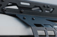 Detail view of mounting connection of the 2024+ Toyota Land Cruiser & Lexus GX 550 Exterior Window Molle Panels to the  Land Cruiser & Lexus GX 550 Spec Series Roof Rack