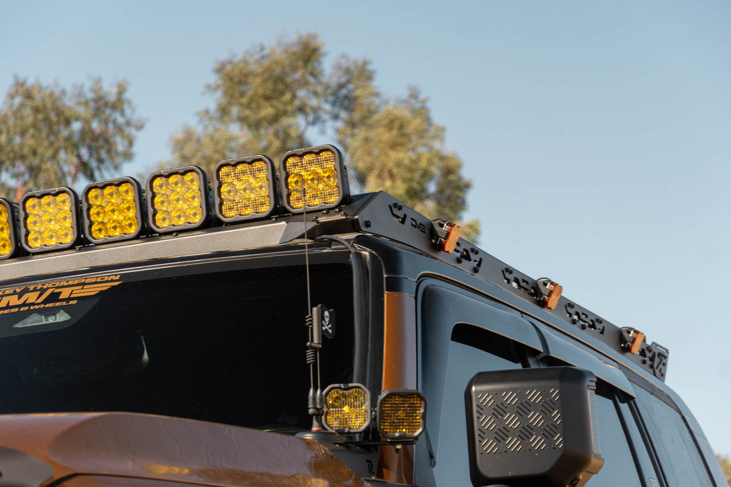 Light Mount for the Toyota Land Cruiser 250 Series & Lexus GX 550 Roof Rack, outdoors in front of tree